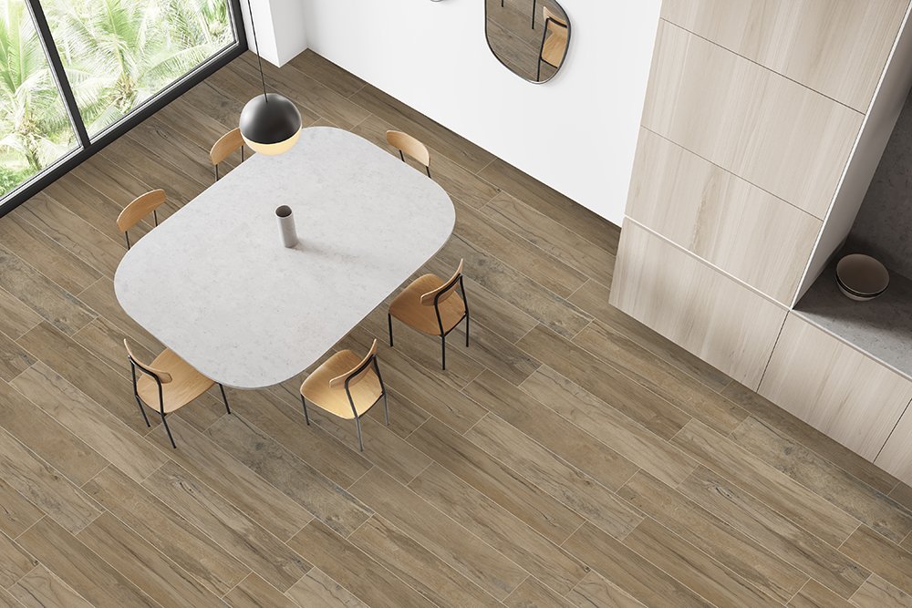 Top view of light kitchen interior with eating table and countertop, kitchenware MADISON GREY 20X120 - Imagen 1